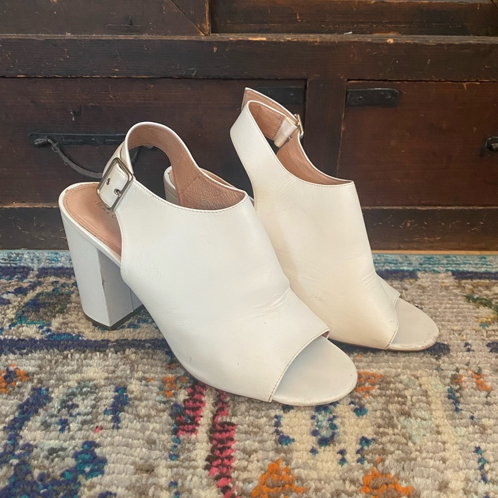 White open toe heel with silver buckle